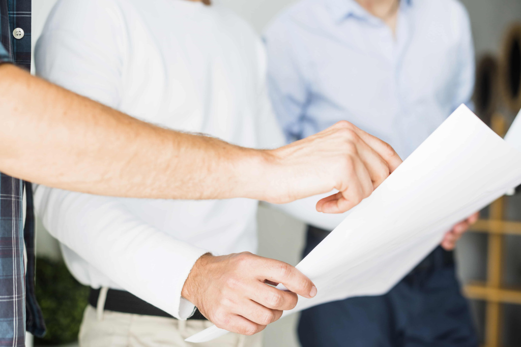 close-up-two-architect-s-hand-with-blueprint-min.jpg Документация 87 постановление