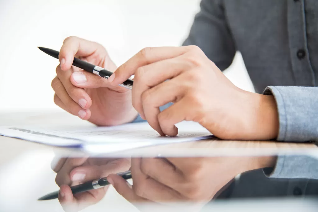 businessman-sitting-table-with-pen-hands (2).jpg Отказное письмо